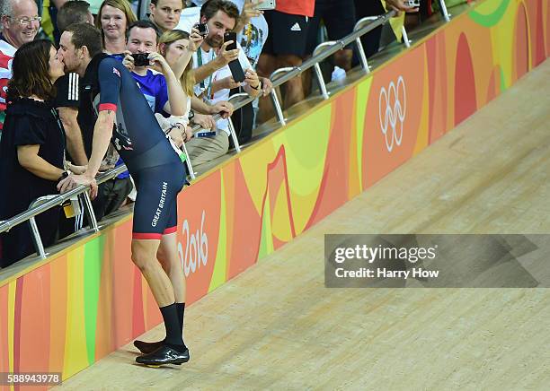 Bradley Wiggins of Team Great Britain kisses his wife Catherine to celebrate winning the gold medal after the Men's Team Pursuit Final for Gold on...