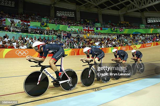 Edward Clancy, Steven Burke, Owain Doull and Bradley Wiggins of Team Great Britain competes in the Men's Team Pursuit Final for Gold on Day 7 of the...