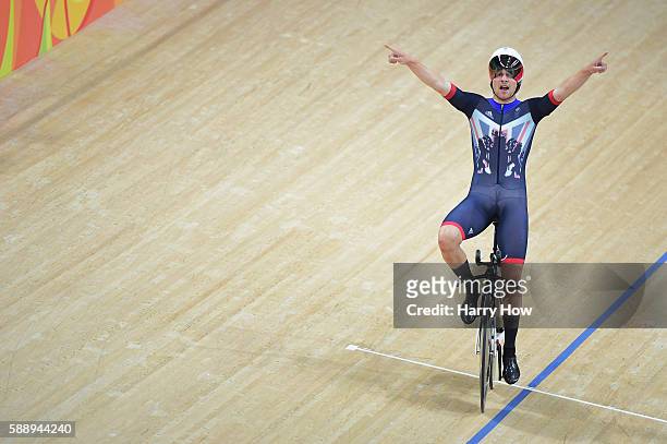 Edward Clancy, Steven Burke, Owain Doull and Bradley Wiggins of Team Great Britain celebrates winning the gold medal after the Men's Team Pursuit...