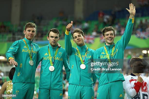 Silver medalists Michael Hepburn, Jack Bobridge, Sam Welsford and Alexander Edmondson of Australia celebrate on the podium at the medal ceremony for...