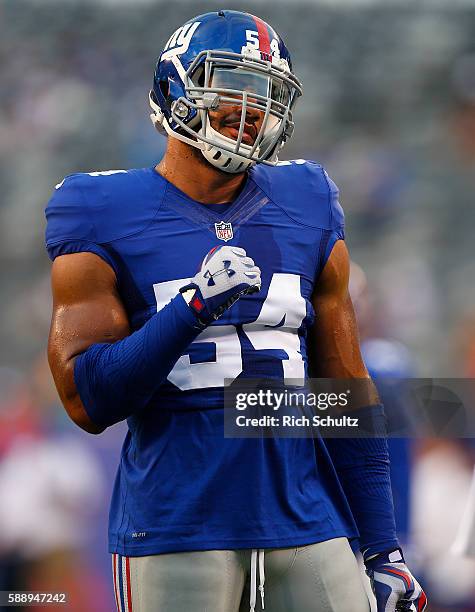 Olivier Vernon of the New York Giants of the New York Giants during warm ups before an NFL preseason game against the Miami Dolphins at MetLife...