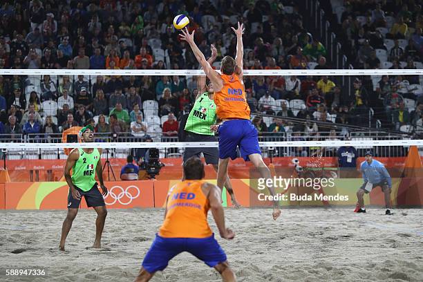 Juan Ramon Virgen Pulido of Mexico and Rodolfo Lombardo Ontiveros Gomez of Mexico compete with Christiaan Varenhorst and Reinder Nummerdor of...