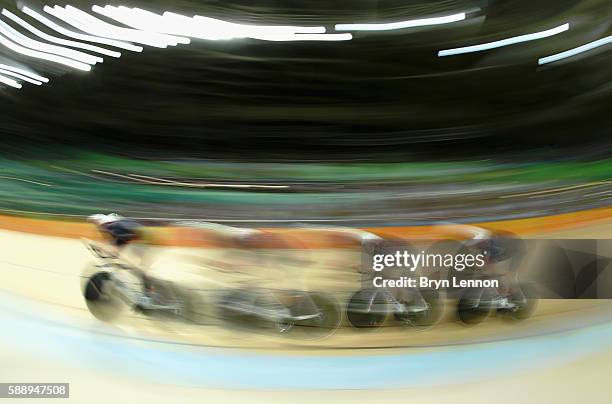 Edward Clancy, Steven Burke, Owain Doull and Bradley Wiggins of Team Great Britain competes in the Men's Team Pursuit First Round on Day 7 of the Rio...