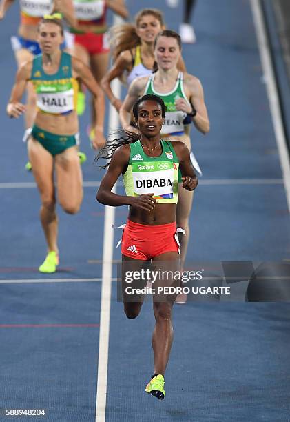 Ethiopia's Genzebe Dibaba competes in the Women's 1500m Round 1 during the athletics event at the Rio 2016 Olympic Games at the Olympic Stadium in...