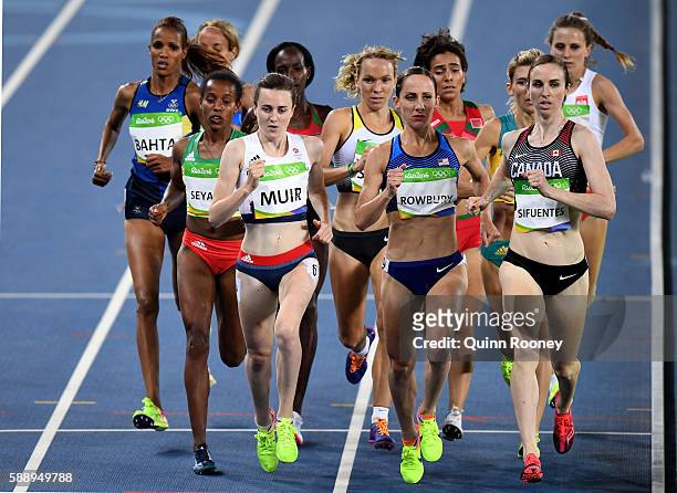 Laura Muir of Great Britain, Shannon Rowbury of the United States and Nicole Sifuentes of Canada compete in round three of the Women's 1500 metres on...