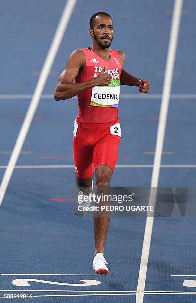 Trinidad and Tobago's Machel Cedenio competes in the Men's 400m Round 1 during the athletics event at the Rio 2016 Olympic Games at the Olympic...