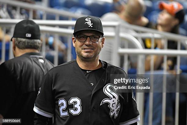 Robin Ventura of the Chicago White Sox smiles in the dugout during the game against the Miami Marlins at Marlins Park on August 12, 2016 in Miami,...