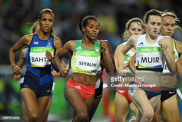 Meraf Bahta of Sweden, Dawit Seyaum of Ethiopia and Laura Muir of Great Britain compete in round one of the Women's 1500 metres on Day 7 of the Rio...