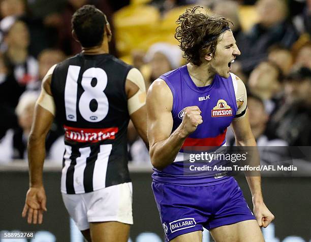 Marcus Bontempelli of the Bulldogs celebrates a goal during the 2016 AFL Round 21 match between the Western Bulldogs and the Collingwood Magpies at...