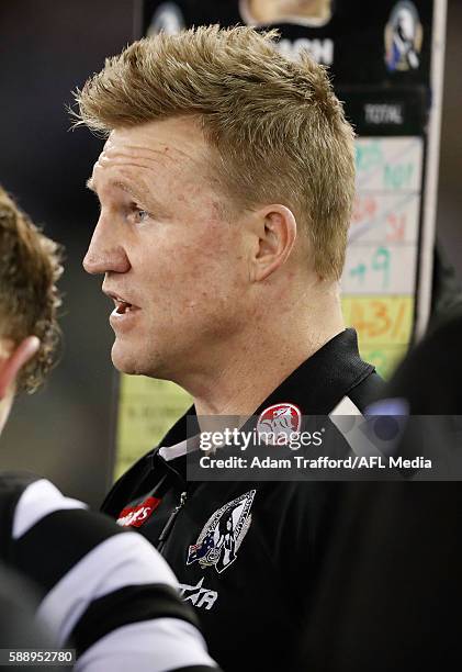 Nathan Buckley, Senior Coach of the Magpies addresses his players during the 2016 AFL Round 21 match between the Western Bulldogs and the Collingwood...