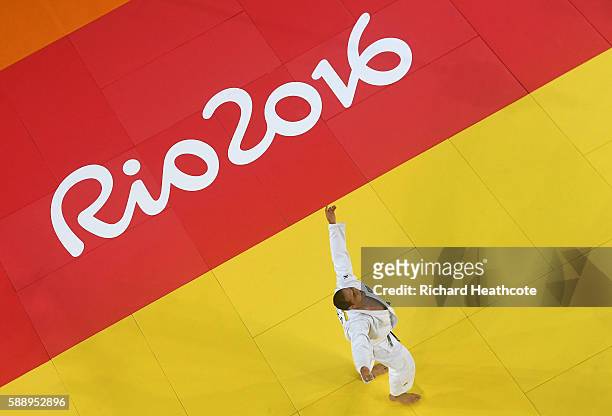 Bronze medalist Rafael Silva of Brazil celebrates after defeating Abdullo Tangriev of Uzbekistan during the Men's +100kg Judo contest on Day 7 of the...