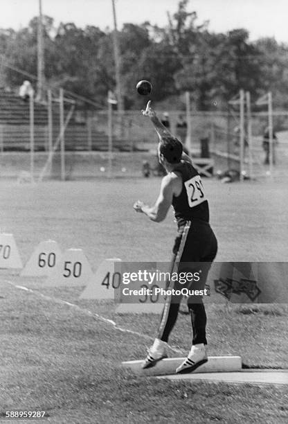 American teacher and decathlete Bill Toomey flings shot put during the Pan American Games, Winnipeg, Manitoba, Canada, August 1967.