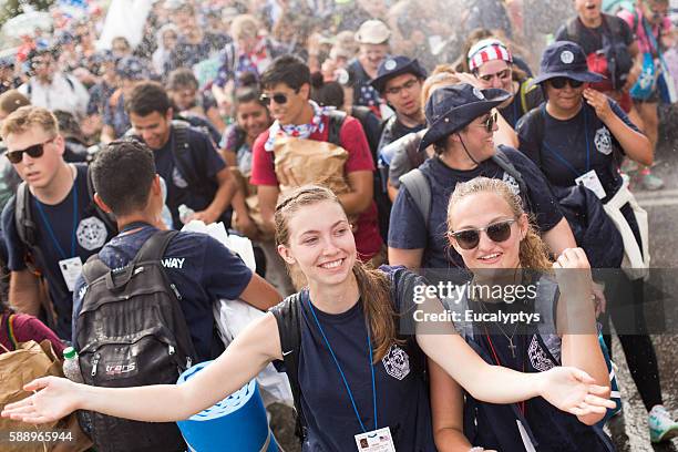 smiling girl throws up hands - world youth day stock pictures, royalty-free photos & images