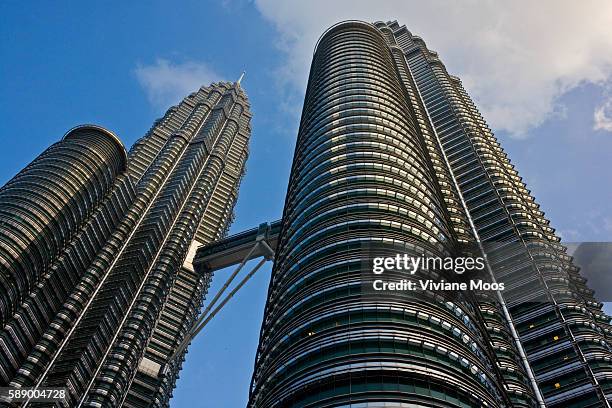 Designed by Argentine-American architect Cesar Pelli, the Petronas Twin Towers remain the tallest twin buildings in the world. The facade of the...