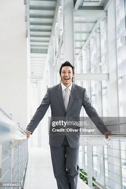 laughing businessman - oliver eltinger fotografías e imágenes de stock