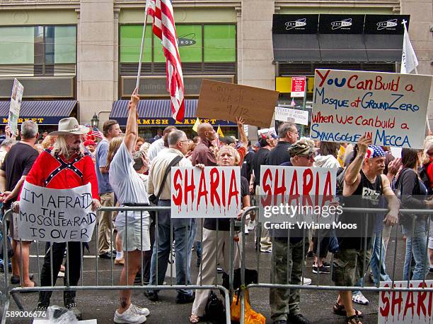 Signs with Sharia dripping blood held by demonstrators, part of the Coalition to Honor Ground Zero holding a rally. Coalition to Honor Ground Zero...