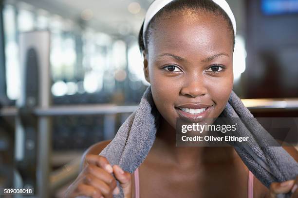 woman with towel around neck - oliver eltinger stock pictures, royalty-free photos & images