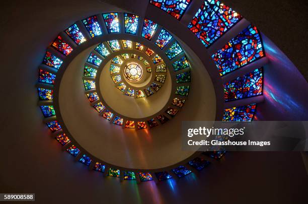 stained glass in spiral pattern, "glory window", thanks-giving square chapel, dallas, texas, usa - chapel interior stock pictures, royalty-free photos & images