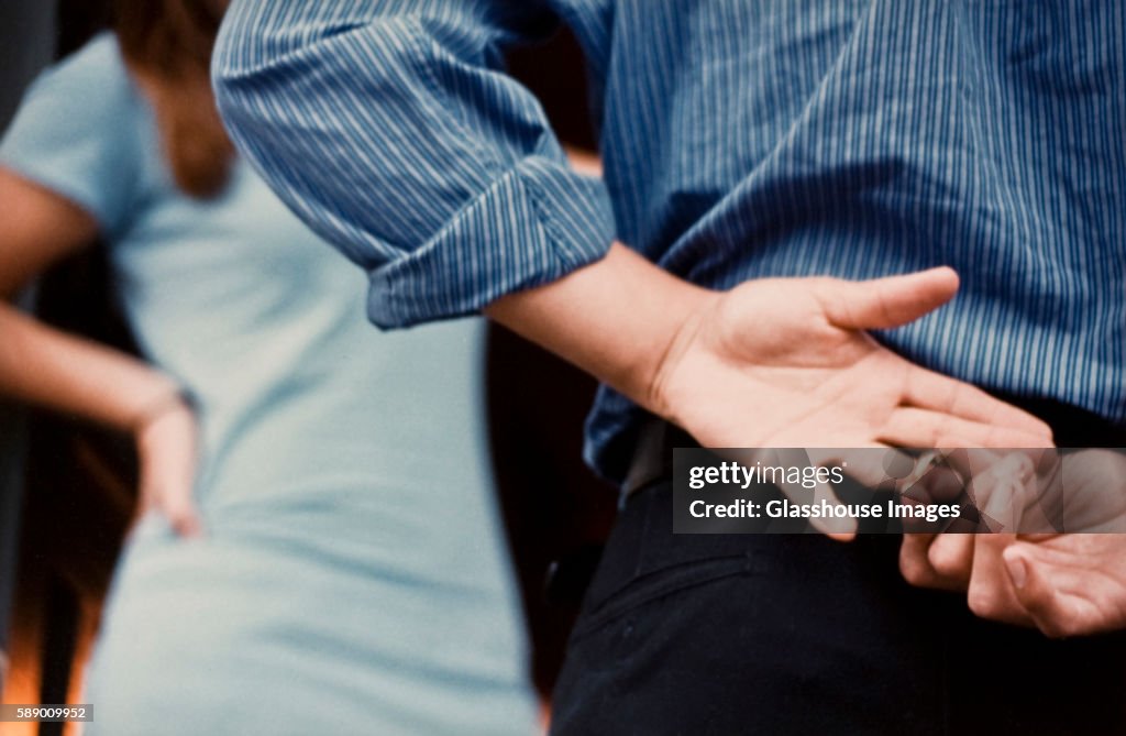 Man Removing Wedding Ring