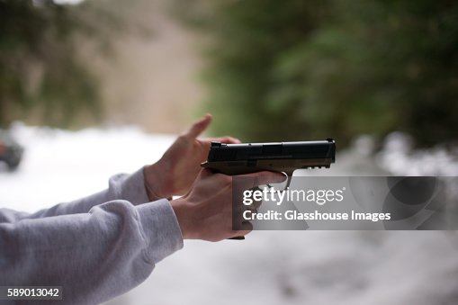 Man Aiming Handgun, Profile Man Aiming Handgun, Profile
