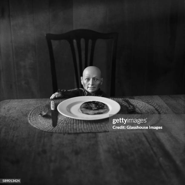 doll and dinner table - doll house stockfoto's en -beelden