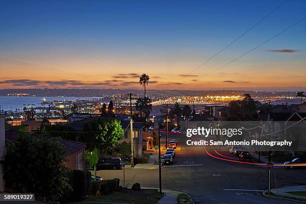 city neighborhood night view of airport runway - san diego county stock pictures, royalty-free photos & images