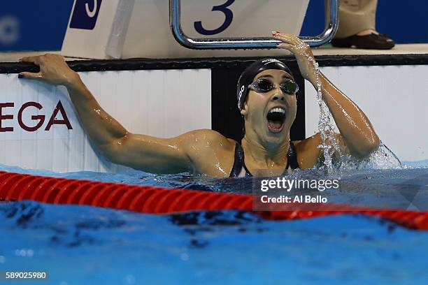 Madeline Dirado of the United States celebrates winning gold in the Women's 200m Backstroke Final on Day 7 of the Rio 2016 Olympic Games at the...