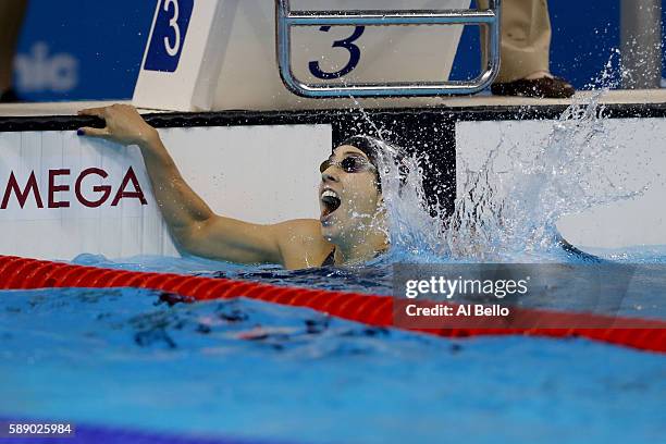 Madeline Dirado of the United States celebrates winning gold in the Women's 200m Backstroke Final on Day 7 of the Rio 2016 Olympic Games at the...