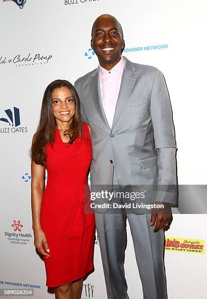 Former NBA player John Salley and Natasha Duffy attend 16th Annual Harold and Carole Pump Foundation Gala at The Beverly Hilton Hotel on August 12,...