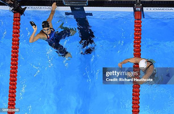 Madeline Dirado of the United States celebrates will gold ahead of Katinka Hosszu of Hungary in the Women's 200m Backstroke Final on Day 7 of the Rio...
