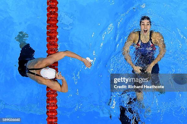 Madeline Dirado of the United States celebrates will gold ahead of Katinka Hosszu of Hungary in the Women's 200m Backstroke Final on Day 7 of the Rio...