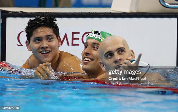 Joseph Schooling of Singapore celebrates winning the Men's 100m Butterfly with Chad Le Clos and Laszlo Cseh on Day 7 of the Rio 2016 Olympic Games at...