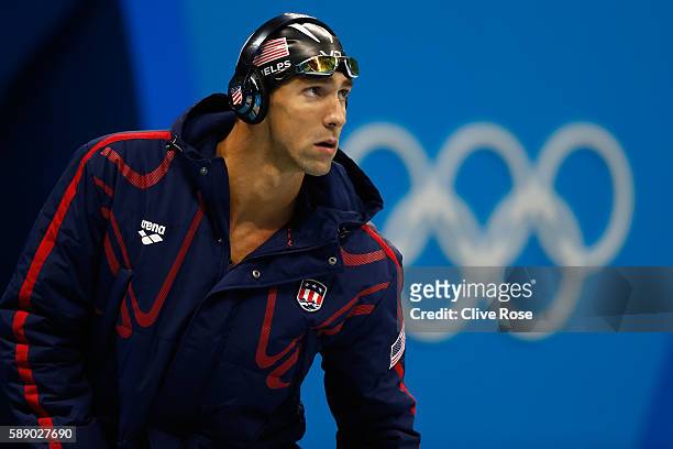 Michael Phelps of the United States looks on before competing in the Men's 100m Butterfly Final on Day 7 of the Rio 2016 Olympic Games at the Olympic...