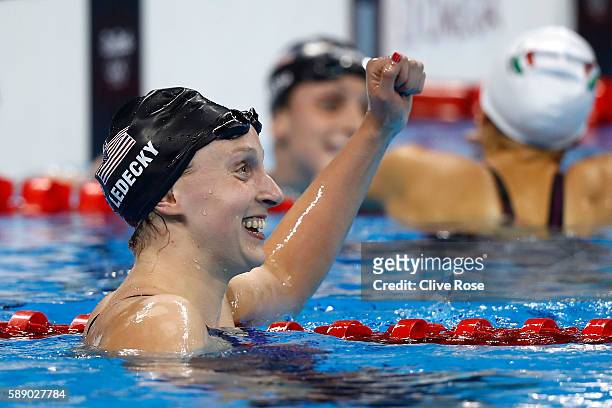 Katie Ledecky of the United States celebrates winning gold and setting a new world record in the time of 8:04.79sec in the Women's 800m Freestyle...