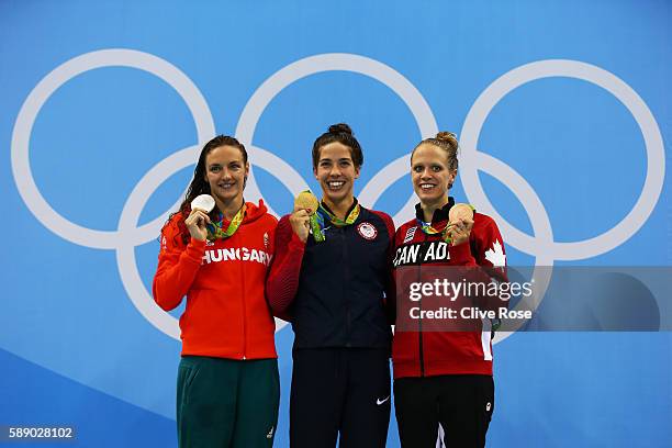 Silver medalist Katinka Hosszu of Hungary, gold medalist Madeline Dirado of the United States and bronze medalist Hilary Caldwell of Canada pose on...