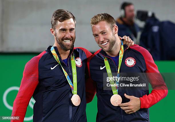Bronze medalists Steve Johnson and Jack Sock of the United States stand on the podium after the Men's Doubles competition on Day 7 of the Rio 2016...