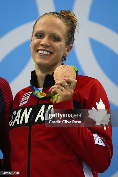 Bronze medalist Hilary Caldwell of Canada poses on the podium during the medal ceremony for the Women's 200m Backstroke Final on Day 7 of the Rio...