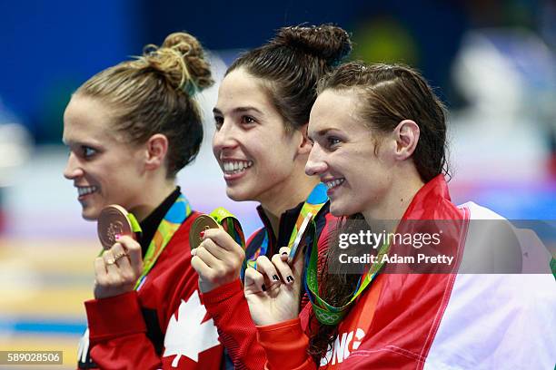 Bronze medalist Hilary Caldwell of Canada, gold medalist Madeline Dirado of the United States and Silver medalist Katinka Hosszu of Hungary pose...