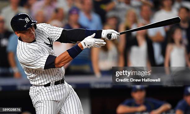 Alex Rodriguez of the New York Yankees strikes out in the fifth inning against the Tampa Bay Rays at Yankee Stadium on August 12, 2016 in New York...