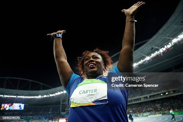 Michelle Carter of the United States celebrates placing first in the Women's Shot Put Final on Day 7 of the Rio 2016 Olympic Games at the Olympic...