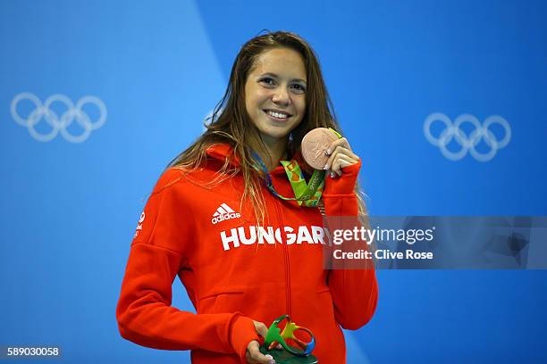 Boglarka Kapas of Hungary celebrates on the podium after winning bronze in the Women's 800m Freestyle Final on Day 7 of the Rio 2016 Olympic Games at...