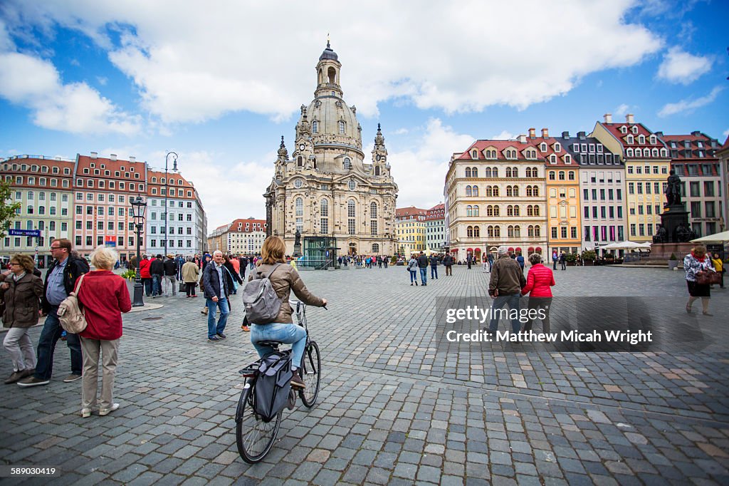 Tourists wander the streets of Dresden.