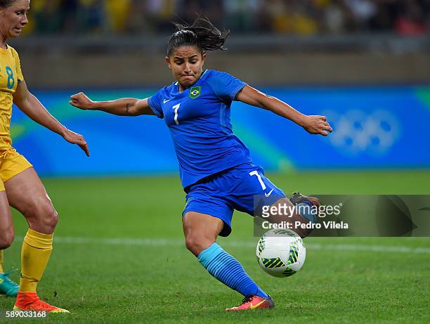 Debora of Brazil kicks the ball against Elise Kellond-Knight of Australia during the second half of the Women's Football Quarterfinal match at...