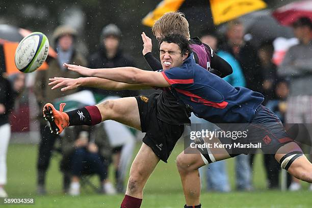 Xavier Roe of Hamilton Boys High School narrowly misses havinga kick charged down during the Super Eight 1st XV Final match between Hastings Boys...