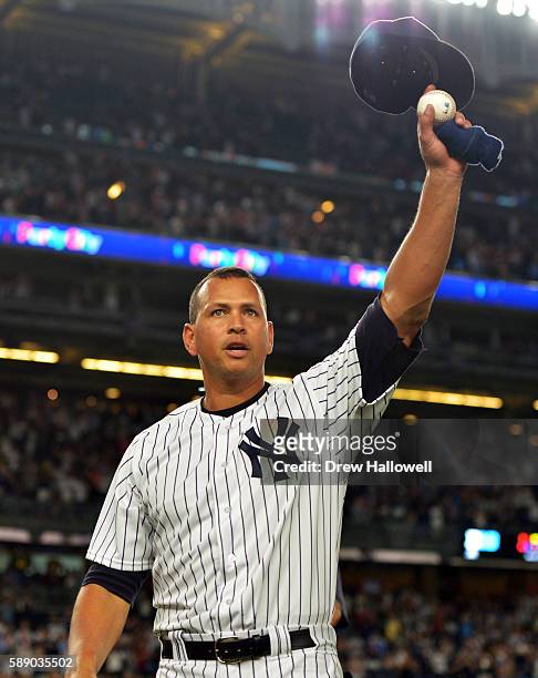 Alex Rodriguez of the New York Yankees tips his hat to the crowd in the ninth inning against the Tampa Bay Rays at Yankee Stadium on August 12, 2016...