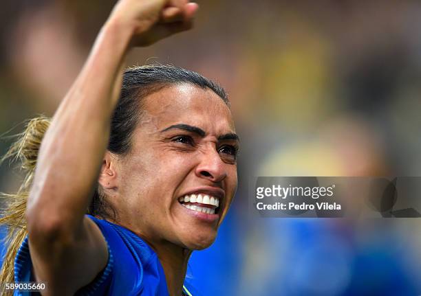Marta of Brazil celebrates their 0-0 win over Australia during the Women's Football Quarterfinal match at Mineirao Stadium on Day 7 of the Rio 2016...