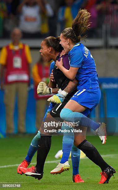 Goalkeeper Barbara of Brazil celebrates with teammate Andressa after Barbara saved a goal during Penalties Shoot-out to win 0-0 against Australia...