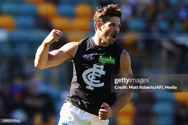 Levi Casboult of the Blues celebrates kicking a goal during the round 21 AFL match between the Brisbane Lions and the Carlton Blues at The Gabba on...