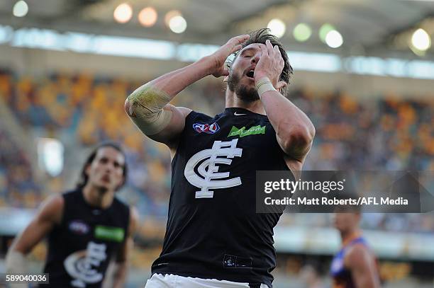 Dale Thomas of the Blues looks dejected after an attempt at goal during the round 21 AFL match between the Brisbane Lions and the Carlton Blues at...