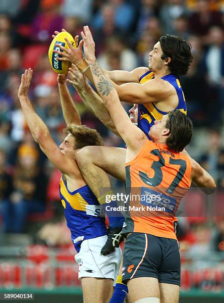 Tom Barrass of the Eagles and Rory Lobb of the Giants contest a mark during the round 21 AFL match between the Greater Western Sydney Giants and the...